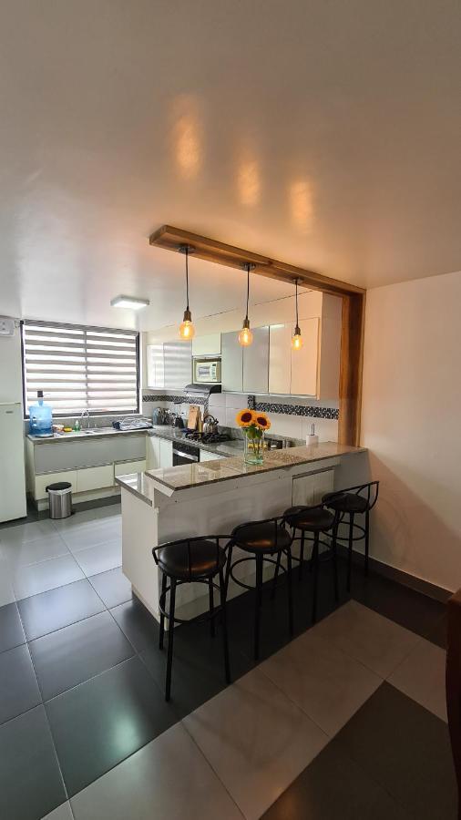 Elegante apartamento con vistas al volcán Tunguraua Baños Esterno foto